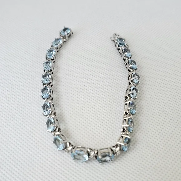 Natural Sky Blue Topaz & Diamond Accent Tennis Bracelet in Sterling Silver! - Picture 2 of 6